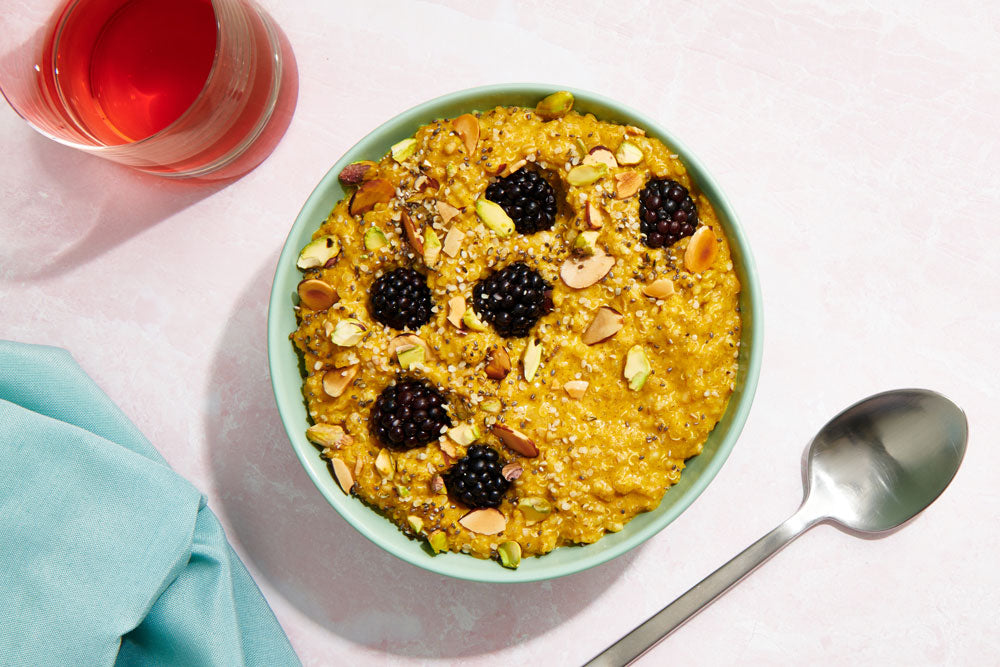 Golden milk and blackberry oat bowl